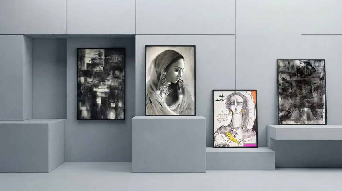 A wall featuring 4 framed abstract pencil art drawings, each with unique patterns and textures in monochromatic tones.
