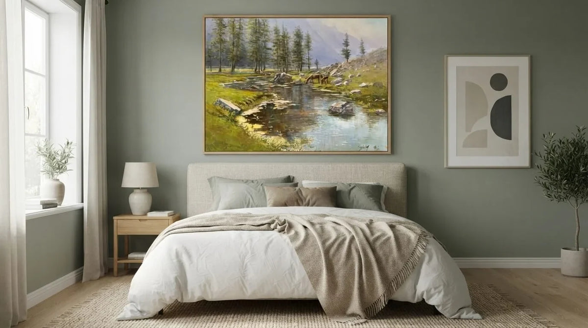 A beautiful framed nature landscape painting displayed as cozy bedroom wall art ideas above a queen size bed.