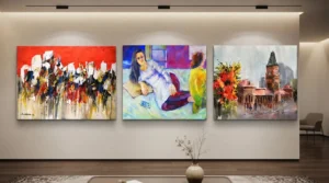 Three expressionism paintings displayed on a living room wall, showcasing vibrant colors and abstract forms.